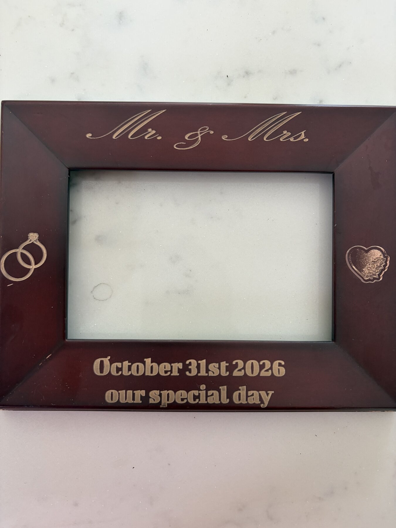 Custom engraved wood photo frame with Mr. and Mrs. and wedding date